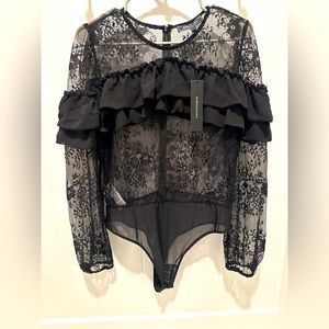 NWT - BCBGMaxazria bodysuit .. lace.. black size large .. new with tags